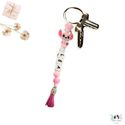 Porte-clé personnalisé disney avec prénom et perles en silicone.